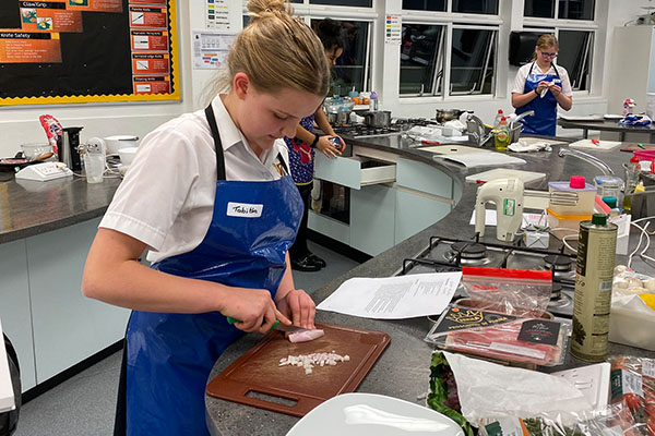 Girls cook at Rotary Young Chef Competition