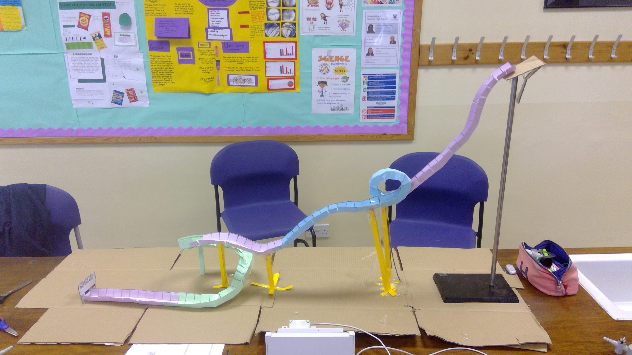 Investigating gravity with marble roller coasters